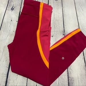 Size 8 red/orange lululemon leggings with pockets